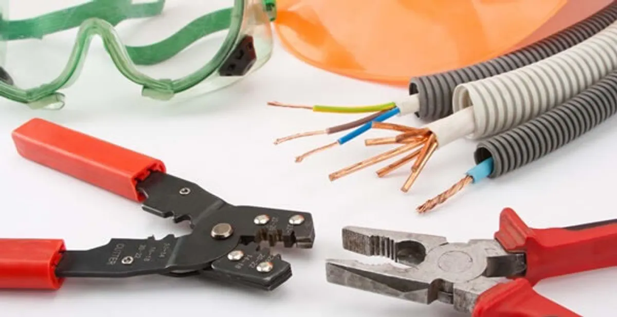 Electrical wiring repair with professional tools and safety equipment in Greenwood, IN