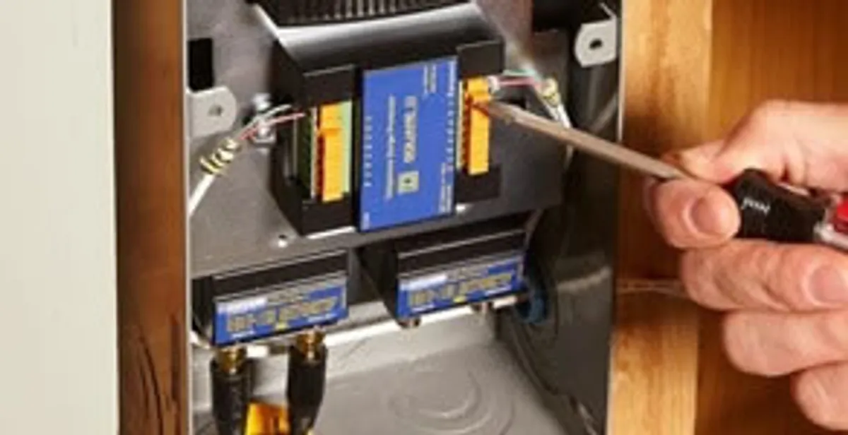 Whole home surge protection device being installed by a licensed electrician to protect electrical systems in Indianapolis, IN